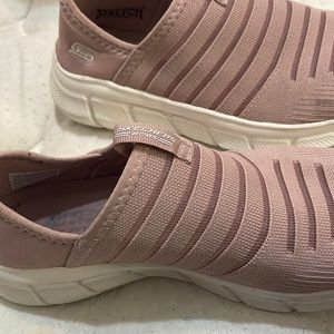 Sketchers slip on shoes.